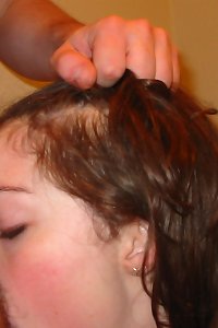 sensual woman pleasuring herself with a toy